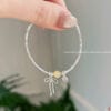 Lắc tay nơ đá phong thuỷ 17 z7858217557443 dce6ebb0da6b407fd49fa07bf63757de