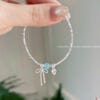 Lắc tay nơ đá phong thuỷ 6 z7858217557454 67aaad97016e92f3d4e5873006c719b4